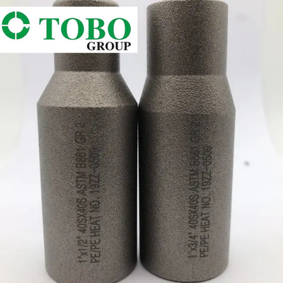 Kute łączniki rurowe Stal stopowa tytanu ASTM B861 GR2 2 '' x 1'' SCH10S x SCH40S Złączka wtłaczana ze stopu tytanu